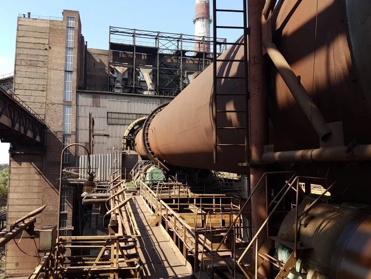 PFK tubular rotary kiln and surrounding process structures